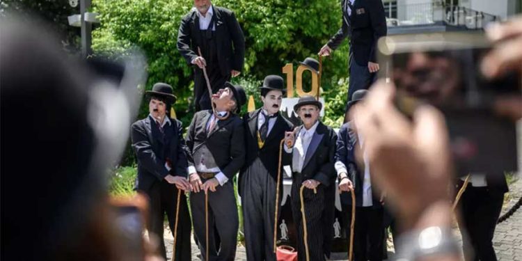 Hundreds gather in Switzerland dressed as Charlie Chaplin to celebrate film legend