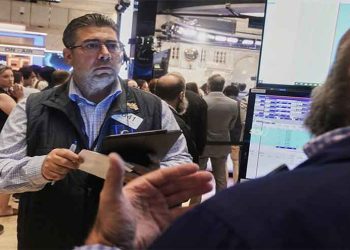 AI spending boom sparks investor concerns over returns and market valuations