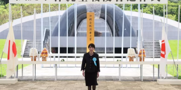 Japanese PM faces protests at Okinawa war memorial over defence policy shift